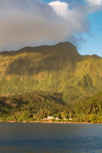 Scenic view of mountains and sea against sky