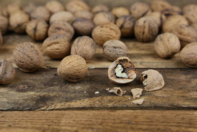 Close-up of walnuts on wooden table