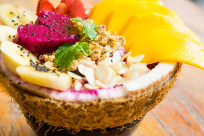 High angle view of fruits in plate on table