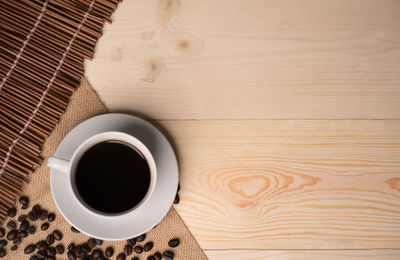 High angle view of coffee cup on table