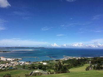 Scenic view of sea against blue sky