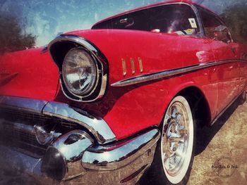 Close-up of red vintage car