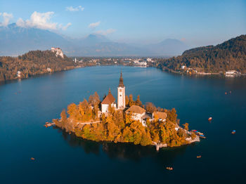 Panoramic view of sea and buildings against sky