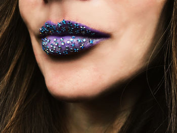 Close-up of woman face with lipstick and make up