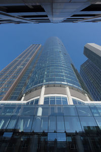 Low angle view of modern building against sky