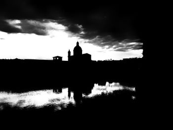 Silhouette of temple against sky