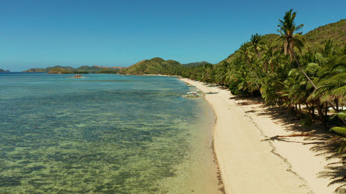 Scenic view of sea against clear sky