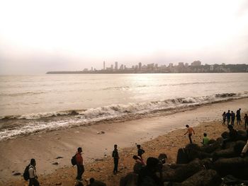 High angle view of silhouette people on beach