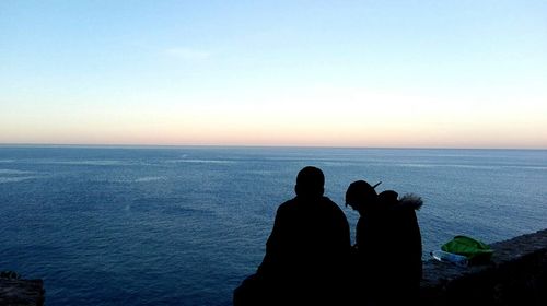 Scenic view of sea at sunset