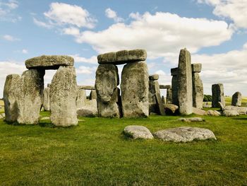 Stone structure in park against sky