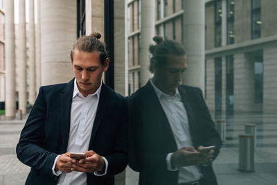 Young man using mobile phone