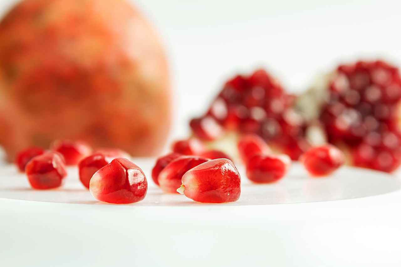 CLOSE-UP OF STRAWBERRIES ON TABLE