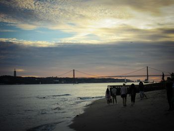 View of suspension bridge on beach