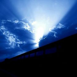 Low angle view of building against blue sky