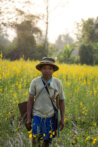 Full length of woman standing on field