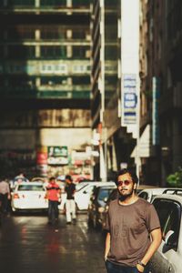 Woman standing in city