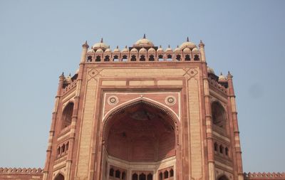 Low angle view of historic building against sky