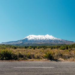 Scenic view of mount ruapehu in new zealand against clear blue morning sky