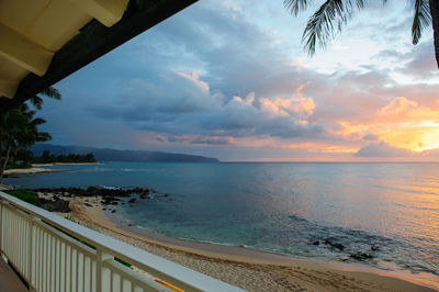 Scenic view of sea against sky during sunset