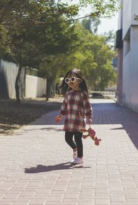 Full length portrait of young woman