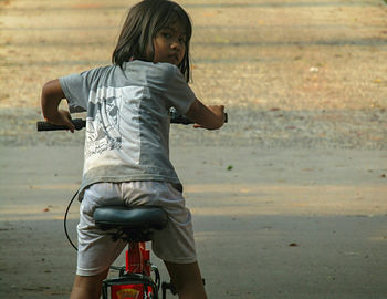 Boy standing on field