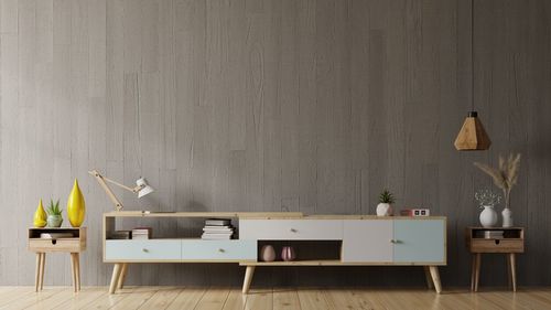 Chairs and table against wall at home