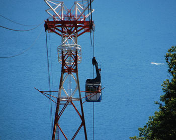 Low angle view of tower against clear blue sky