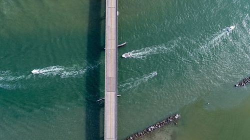 High angle view of umbrella by sea