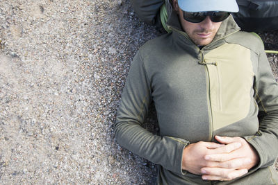 High angle view of backpacker resting after a long travel day.