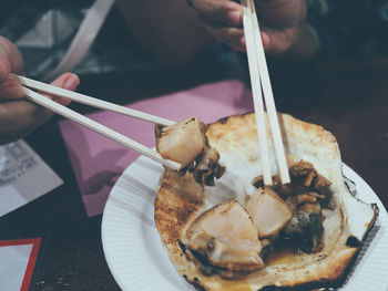 Close-up of man holding food