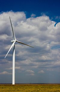 Wind turbines on field