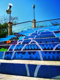 Multi colored water against blue sky