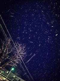 Low angle view of stars in dark sky