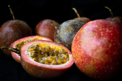 Close-up of apples against black background