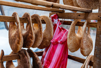 Close-up of clothes hanging in store