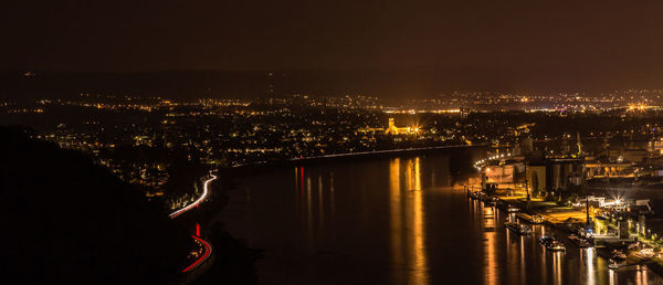 River passing through city at night