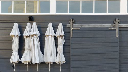 Low angle view of clothes drying against building