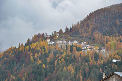 Panoramic view of trees and mountains against sky during autumn