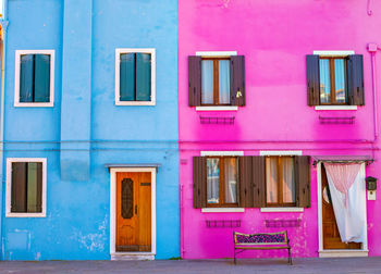 Multi colored houses on building