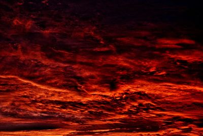 Abstract image of red moon at night