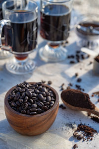 Still life with coffee beans, wooden spoon, making coffee at home