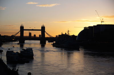 View of bridge over river against sky during sunset