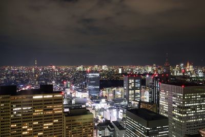 Illuminated cityscape at night