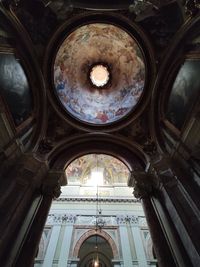 Low angle view of ornate ceiling in building