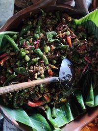 High angle view of chopped vegetables in bowl on table