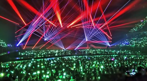 High angle view of crowd in music concert at night