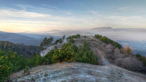 Scenic view of mountains against sky during sunset