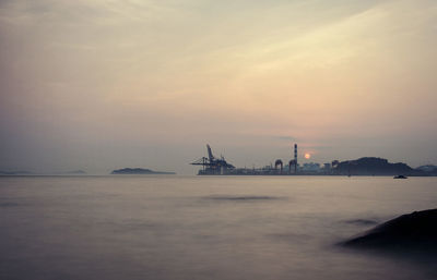 Scenic view of sea at sunset