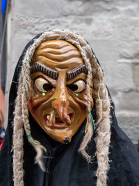 Close-up portrait of man wearing mask