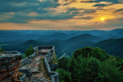 Scenic view of mountains against sky during sunset